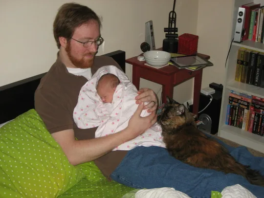 **Awwww**

I’m making progress on window trim, installed a storage system in Abigail’s closet, and mowed the yard, but all of that stuff pales in comparison to **more cute baby pictures!**