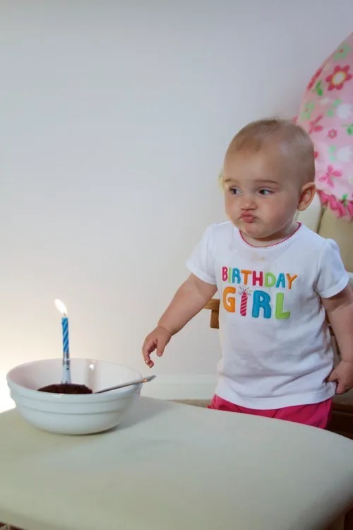 **The birthday girl**

Likes steak… a lot.  

But is still willing to share.  

Is apprehensive about singing birthday candles.

And likes her new telephone toy.