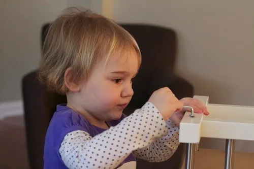 **Determined**

We had a very good weekend. We didn’t really do much beyond baby care, but we never do anyway these days. It’s to be expected. John did go grocery shopping and returned a mirror to Ikea. He picked up a new shoe rack for us and our Abby helped to put it together by screwing in all of the screws. Is it unusual for a two year to have such concentration? On a typical day at our house — yes.  
  

Gwen and Josie spent the past few days working on rolling over. They can now roll onto their sides. They’re also working on pushing themselves up during tummy time. Today, Josie got herself up AND considered an attempt to reach for a nearby toy.