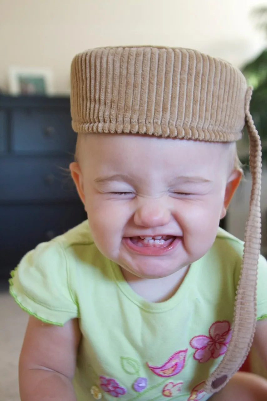Abby still likes this hat and thinks her sisters should too. Are they too young to play dress up?