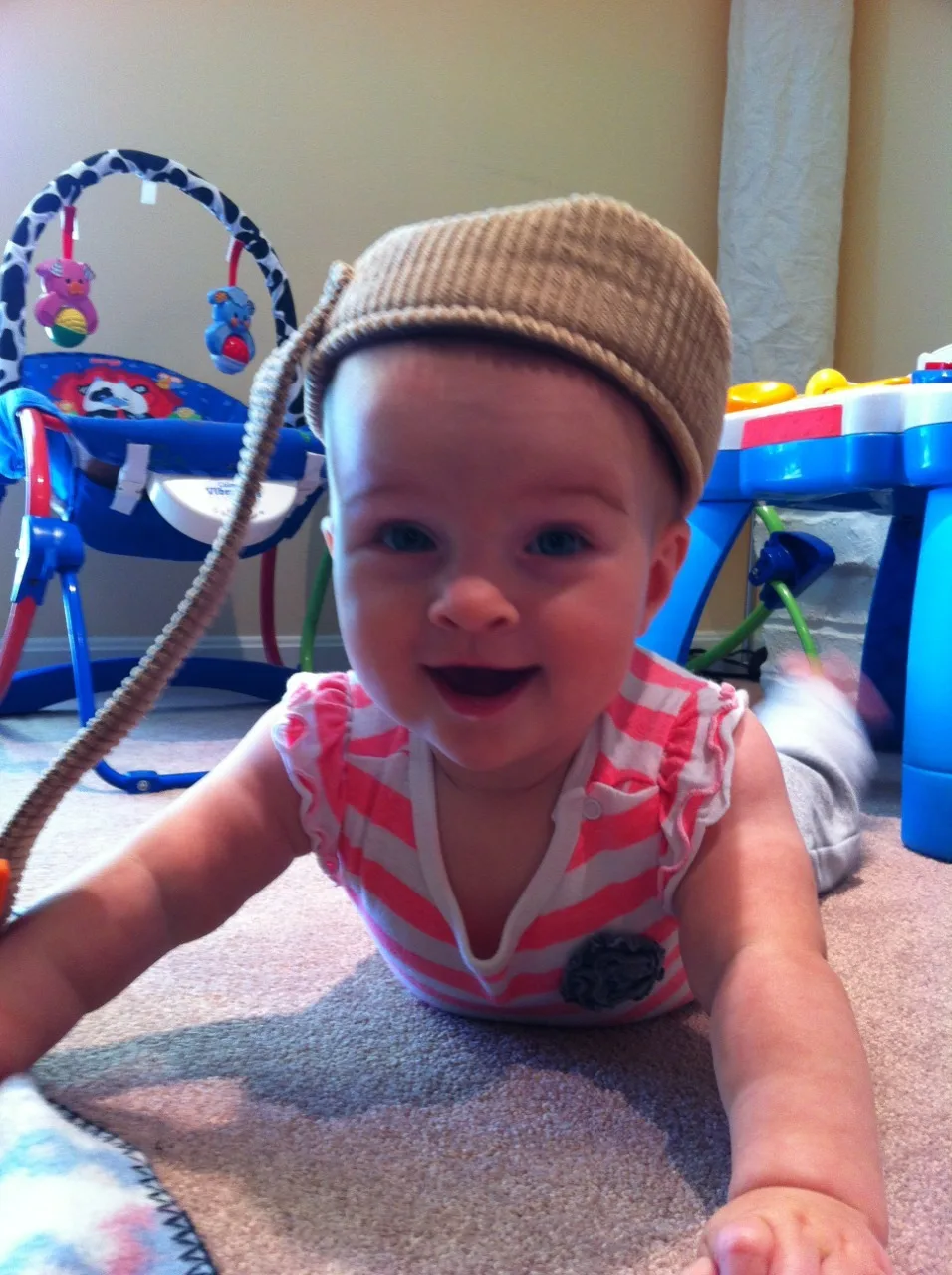 Abby still likes this hat and thinks her sisters should too. Are they too young to play dress up?