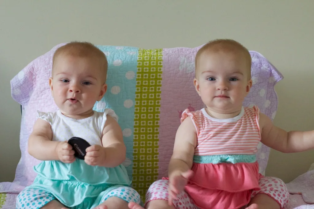 Eight and a half months old! Lots of baby talk (“ma!”) and crawling (attempts by Gwen and rapid acceleration by Josie). Favorite foods right now are cheese and bananas.