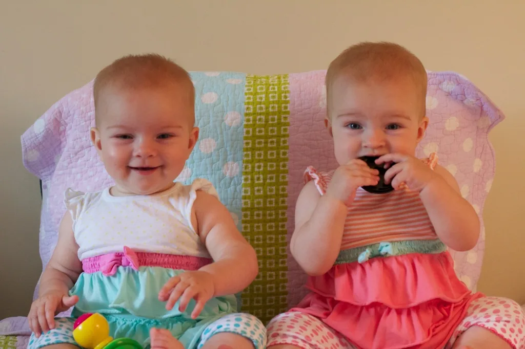 Eight and a half months old! Lots of baby talk (“ma!”) and crawling (attempts by Gwen and rapid acceleration by Josie). Favorite foods right now are cheese and bananas.