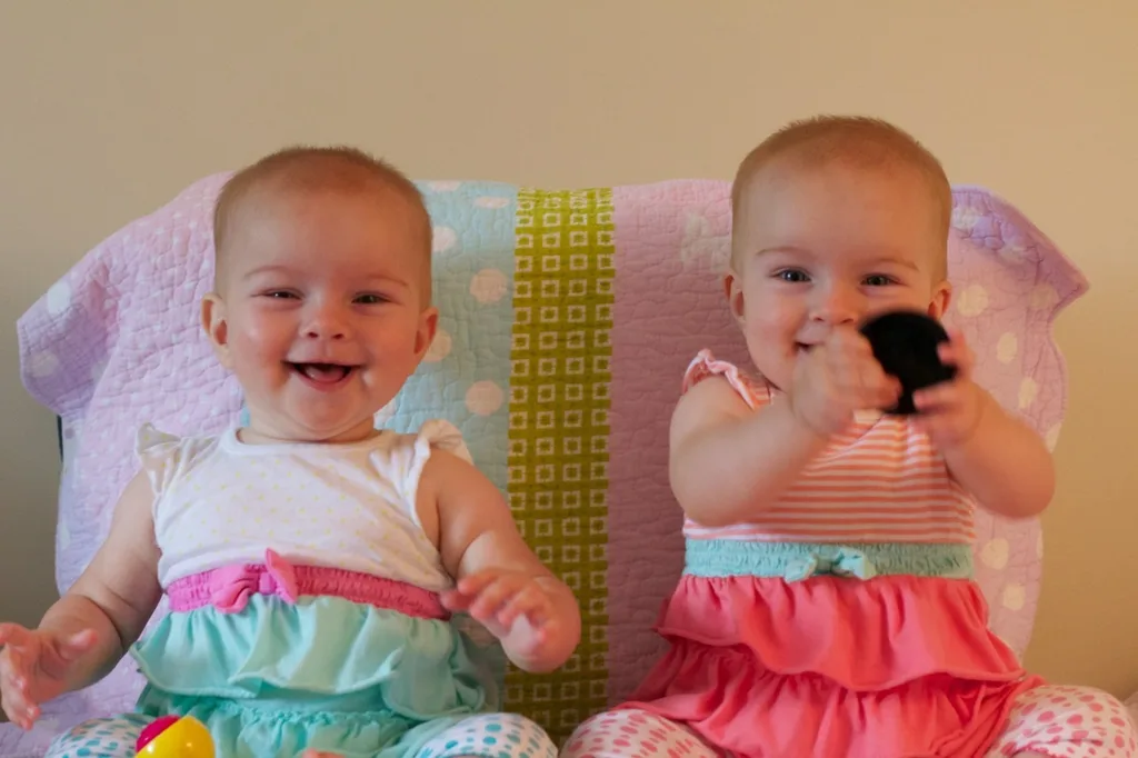 Eight and a half months old! Lots of baby talk (“ma!”) and crawling (attempts by Gwen and rapid acceleration by Josie). Favorite foods right now are cheese and bananas.