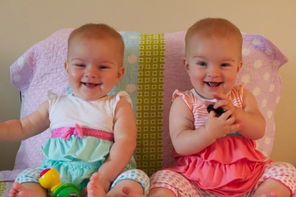 Eight and a half months old! Lots of baby talk (“ma!”) and crawling (attempts by Gwen and rapid acceleration by Josie). Favorite foods right now are cheese and bananas.