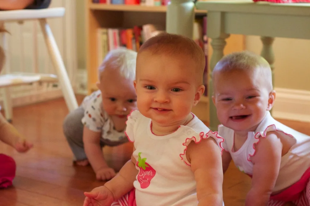 Babies! Babies! Babies! The scene at our house today. Four babies (two sets of nine month old twins) crawling around the kitchen floor hunting for Cheerios. It was a pretty amazing sight.