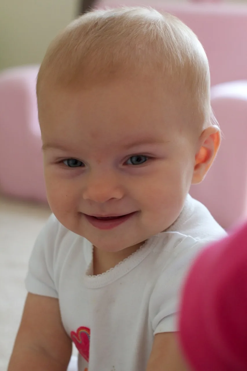 These smiling faces are actually two sick babies. Surprising, right? Lots of pre-emptive pain reliever thankfully kept these girls in happy moods for a surprising amount of the day. Hopefully, our days with Hand Foot Mouth are no worse than this. (And, hopefully, I didn’t just jinx us!)