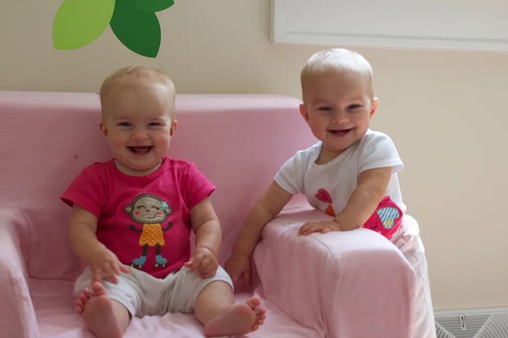 These smiling faces are actually two sick babies. Surprising, right? Lots of pre-emptive pain reliever thankfully kept these girls in happy moods for a surprising amount of the day. Hopefully, our days with Hand Foot Mouth are no worse than this. (And, hopefully, I didn’t just jinx us!)