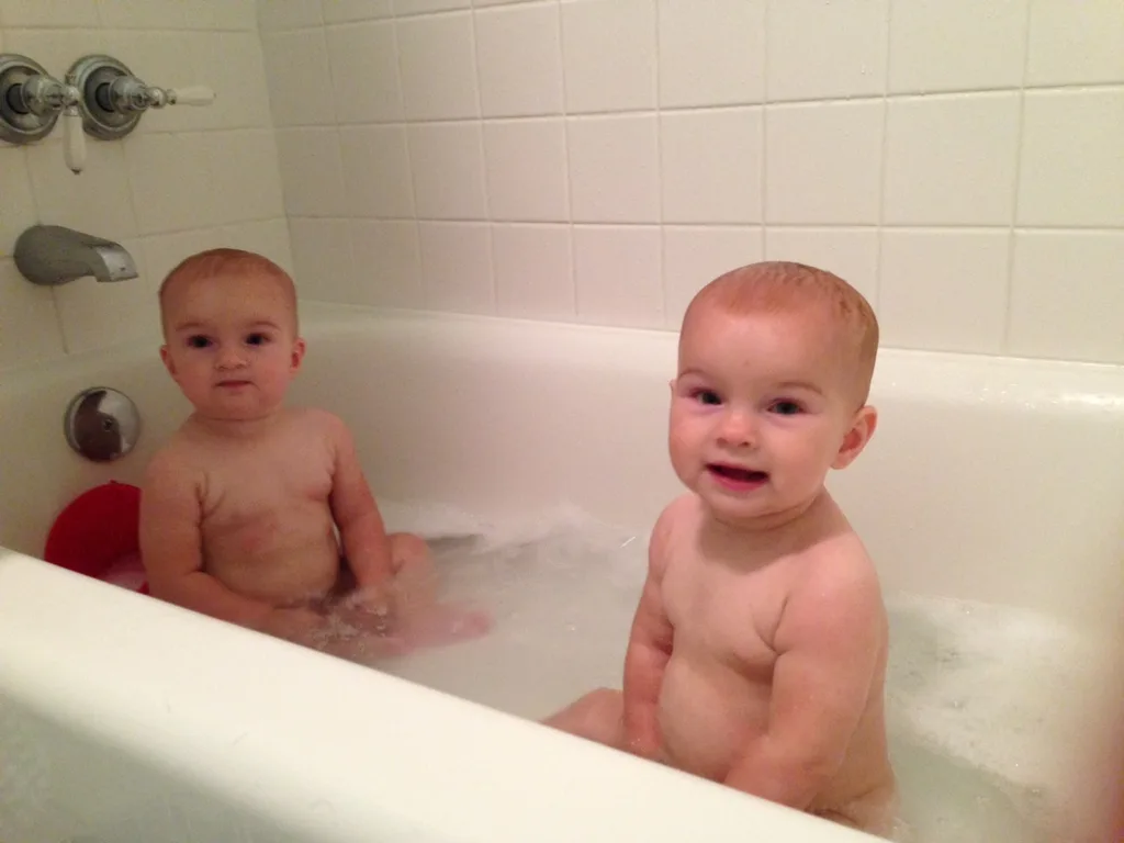 At ten months old (already!), the babies are doing some amazing things. They’re both accomplished crawlers, and can pull themselves up on everything. They’re also both trying to talk. They say “ma” for sure and Gwen seems to say teeth, cat, and cheese. They understand a lot more than they can say. They love pat-a-cake, and will bounce up and down to music. They also love feeding themselves finger foods. Their current favorites are canned vegetables. Potatoes, steak, and blueberries gave us some awesome zzzzs last night. Josie slept until 5am, woke up for some milk, and then went back to sleep until 7:30am! Gwen did great too. She was up at 2am and 6am, and then slept until 7:30am! Amazing!