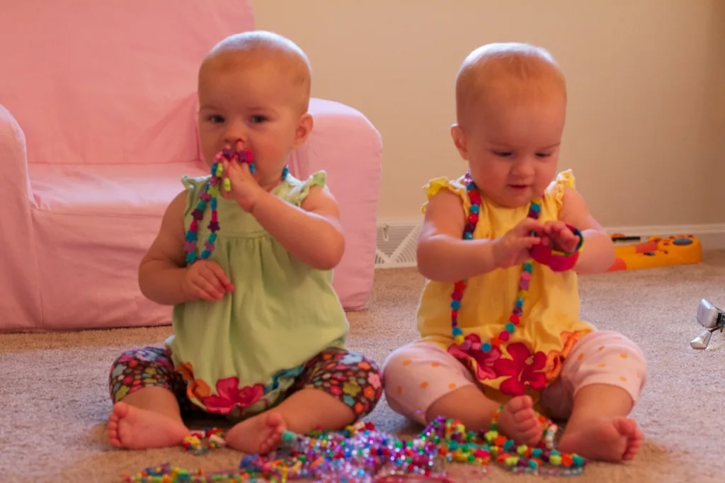 At ten months old (already!), the babies are doing some amazing things. They’re both accomplished crawlers, and can pull themselves up on everything. They’re also both trying to talk. They say “ma” for sure and Gwen seems to say teeth, cat, and cheese. They understand a lot more than they can say. They love pat-a-cake, and will bounce up and down to music. They also love feeding themselves finger foods. Their current favorites are canned vegetables. Potatoes, steak, and blueberries gave us some awesome zzzzs last night. Josie slept until 5am, woke up for some milk, and then went back to sleep until 7:30am! Gwen did great too. She was up at 2am and 6am, and then slept until 7:30am! Amazing!