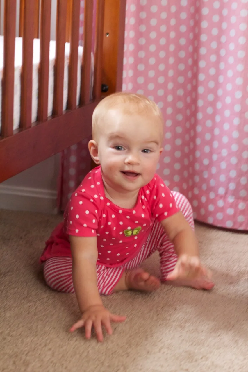Gosh, are they getting big! Since we had a relaxing day at home today, I was encouraged to break out the camera. They don’t really hold still for long, but I was able to snap a few shots while they played — together!

One thing that really strikes me about twins is that they’re already playing together. It seemed like Abby was much older before she started playing with other babies. I guess when you’re always around another baby and you have a big sister, you figure out there’s fun to be had. They frequently play together, get into trouble together, and they seem to be having conversations already too. That last part is quite impressive since their only consistently recognizable word is “Ma.”