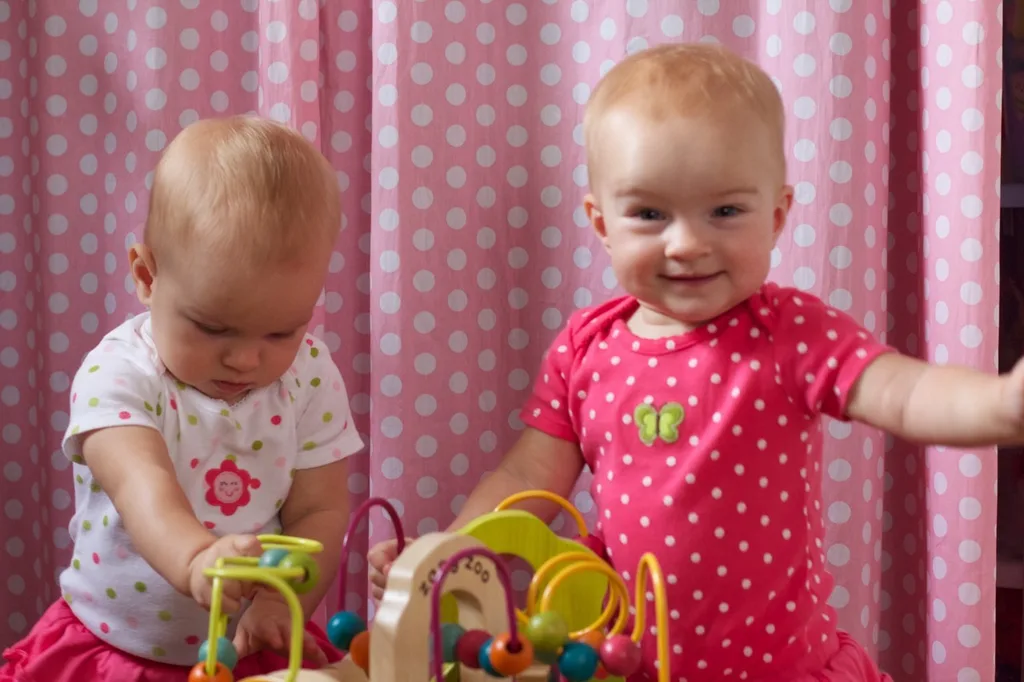 Gosh, are they getting big! Since we had a relaxing day at home today, I was encouraged to break out the camera. They don’t really hold still for long, but I was able to snap a few shots while they played — together!

One thing that really strikes me about twins is that they’re already playing together. It seemed like Abby was much older before she started playing with other babies. I guess when you’re always around another baby and you have a big sister, you figure out there’s fun to be had. They frequently play together, get into trouble together, and they seem to be having conversations already too. That last part is quite impressive since their only consistently recognizable word is “Ma.”