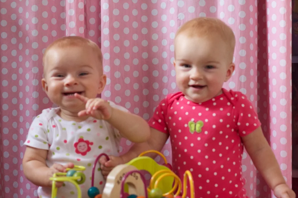 Gosh, are they getting big! Since we had a relaxing day at home today, I was encouraged to break out the camera. They don’t really hold still for long, but I was able to snap a few shots while they played — together!

One thing that really strikes me about twins is that they’re already playing together. It seemed like Abby was much older before she started playing with other babies. I guess when you’re always around another baby and you have a big sister, you figure out there’s fun to be had. They frequently play together, get into trouble together, and they seem to be having conversations already too. That last part is quite impressive since their only consistently recognizable word is “Ma.”