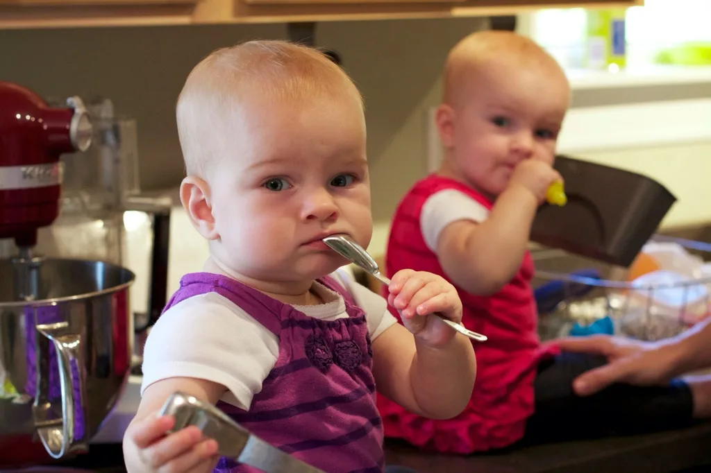 How many helpers does it take to make a birthday cake?