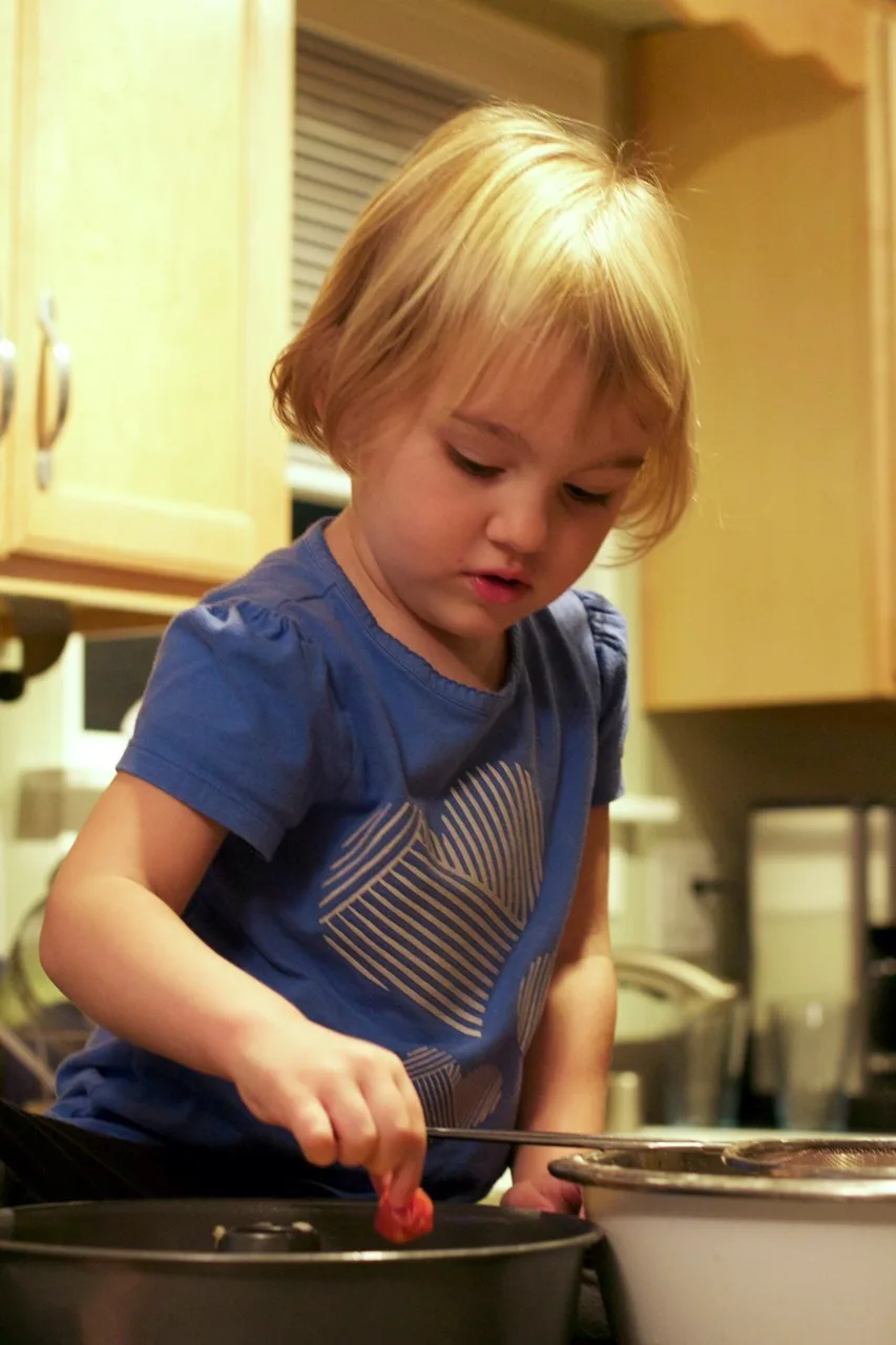 How many helpers does it take to make a birthday cake?