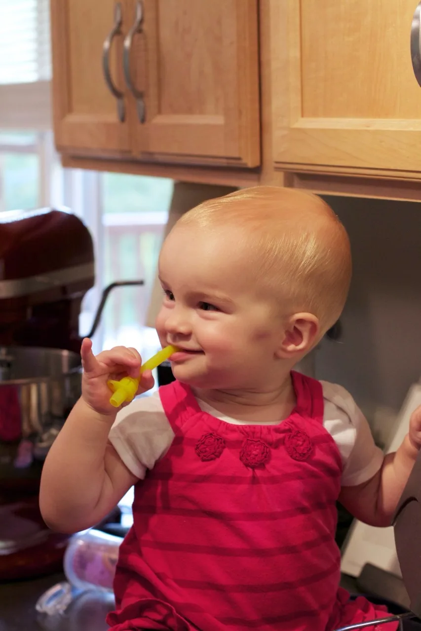 How many helpers does it take to make a birthday cake?
