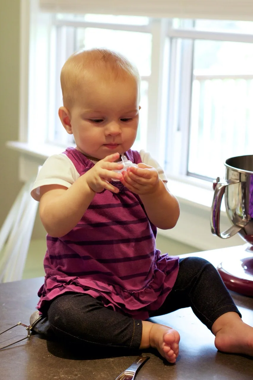 How many helpers does it take to make a birthday cake?