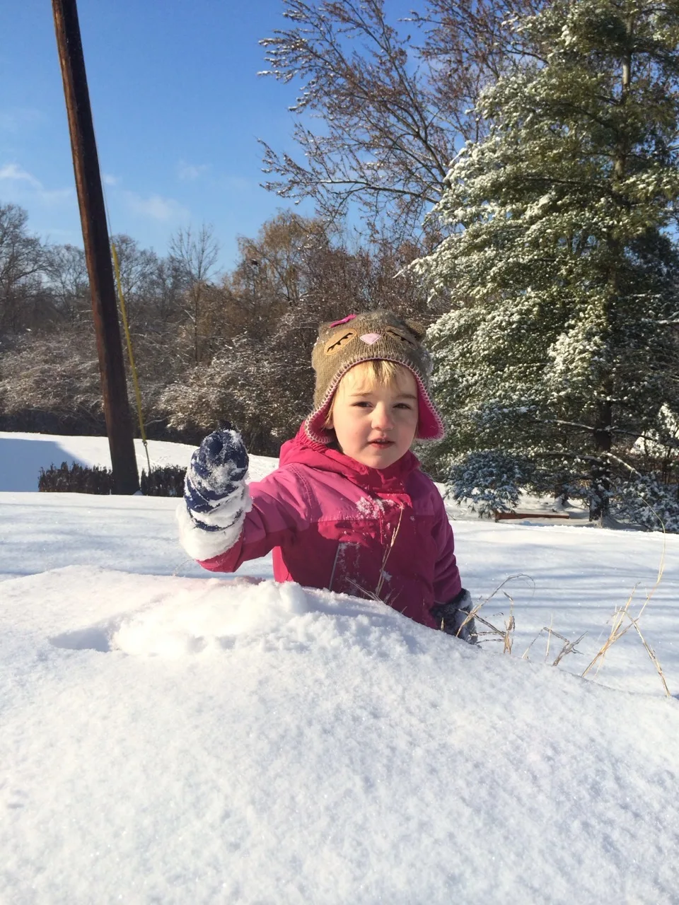 With more snow coming soon, I was reminded that I didn’t post any photos from our last big snowstorm. John and I had a great time taking Abby outside. Abby loves to ride her sled, make snow angels, stomp around, toss snowballs, and eat snow. Yes, she really likes to EAT snow.
