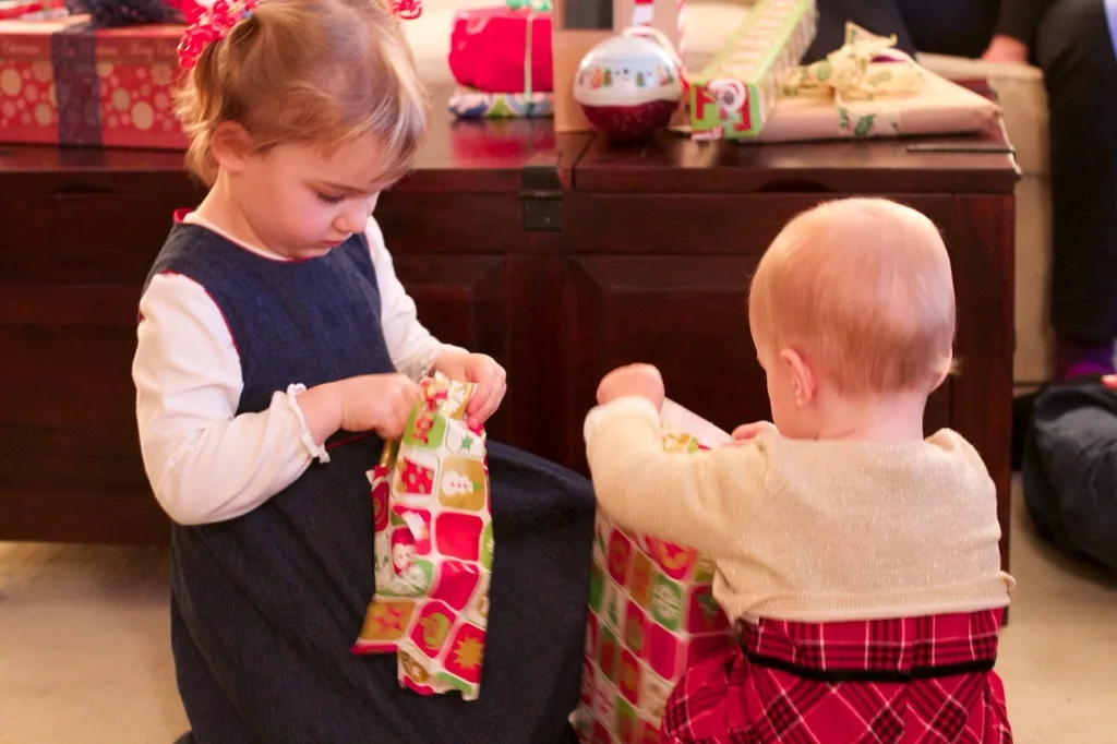 We enjoyed our annual Christmas Eve celebration with family at our house. The girls had fun helping everyone open their presents during the gift grab. Looking back at the pictures to select some for this post, it looks like Ron was the most excited about his present. Good thing no one stole it!