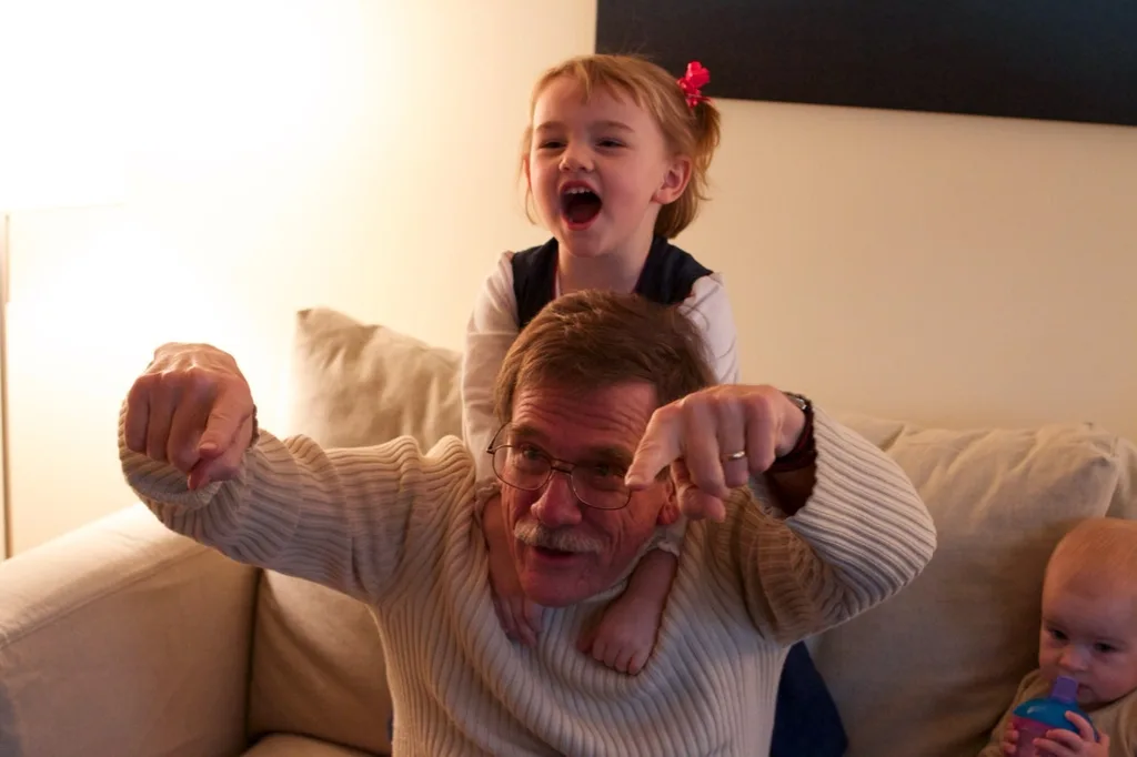 We enjoyed our annual Christmas Eve celebration with family at our house. The girls had fun helping everyone open their presents during the gift grab. Looking back at the pictures to select some for this post, it looks like Ron was the most excited about his present. Good thing no one stole it!
