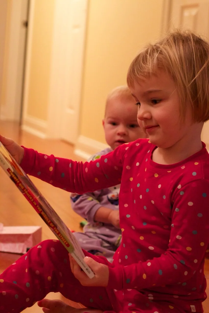 This was our best Christmas morning so far. Abby woke up first, and was surprisingly willing to let the presents sit untouched while we waited for her sisters to wake up. Josie was the second to wake, but no such luck with her. She wanted to investigate! We ended up encouraging Gwen to get out of bed so we could see what Santa brought us.

The girls had lots of fun opening their gifts, and giving gifts. The highlights were a toy train set, an indoor trampoline, some very cute animal hats and gloves, and a bright red toy monster truck for Papa, who just wanted a nice German car. (That was Abby’s gift to John. She looked at Papa’s preferred cars at the store and said they were “too grey, too blue, too boring.” She instead bought a fire truck for Josie, a camper with a beach scene for Gwen, and the monster truck for John. No sports cars for her!)

We took lots of pictures, but Tumblr only allows ten per post. (Sigh.) Christmas afternoon coming next.