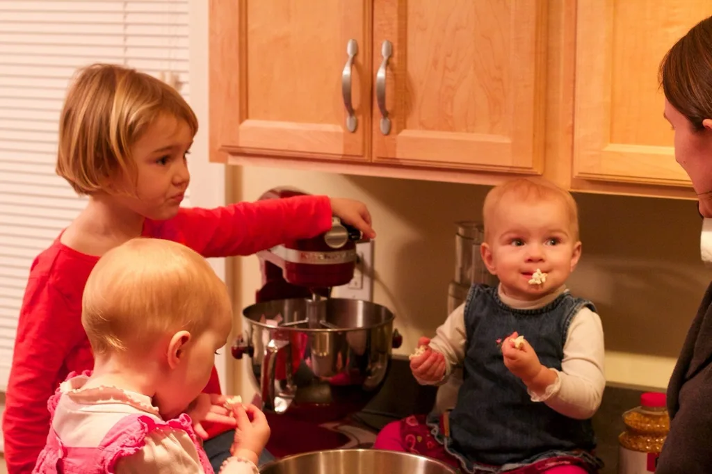 We made popcorn yesterday with our new hot air popcorn maker. Abby and Josie got a kick out of watching it pop the popcorn. Gwen did too until it really started going, and then she cried. They all greatly enjoyed eating the final result though. Thanks to Grandma Susan for remembering something I said last June!