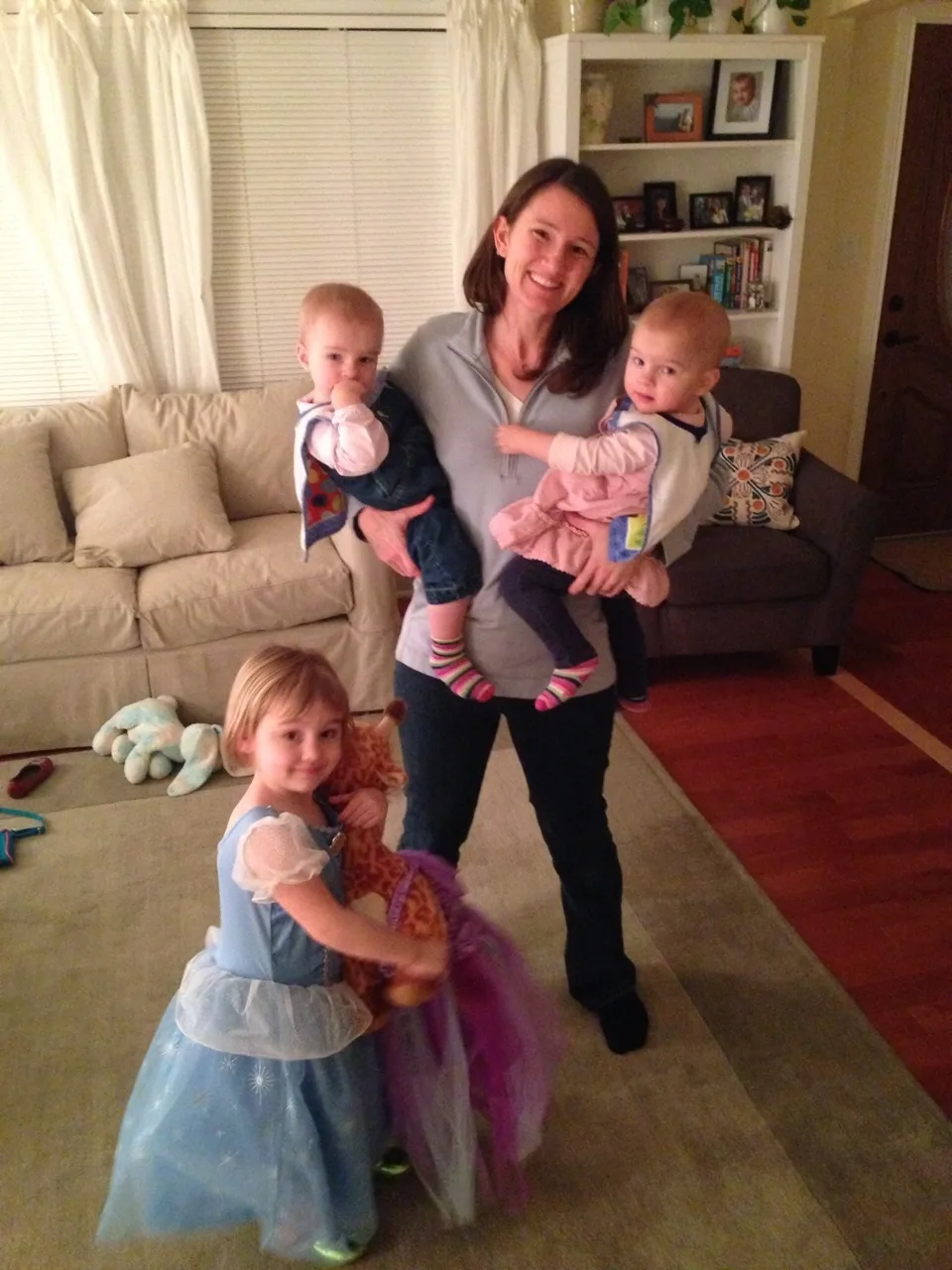 I keep saying “I won’t be able to do this much longer,” but here I am still holding both babies. We were enjoying one of our numerous daily dance parties. (Notice Abby’s Cinderella dress, and Gwen and Josie’s super hero capes? The girls spend their days now dressing up as princesses or flying around as super heroes. Now that’s girl power!)