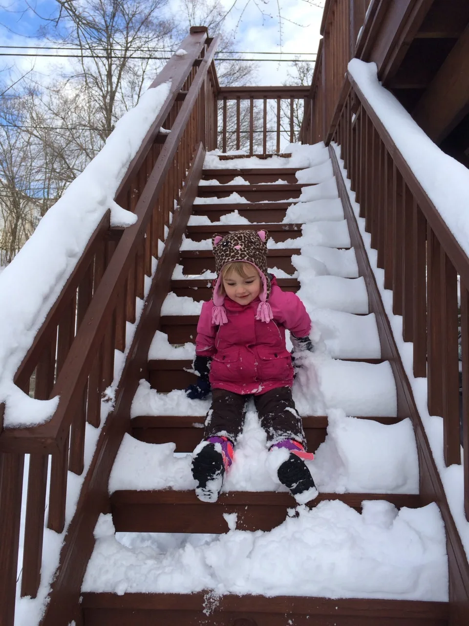 Abby and I had a really good time playing in the snow today. I shoveled our walkways while she climbed the many mountains of snow from the city’s snow plows. After I shoveled about a quarter of the very deep snow drifts on our driveway, we both raced through our backyard to catch the man snow-plowing our neighbors driveway. A little money from us, and he plowed ours too. Abby really liked watching, and my back was much happier. John took her out for a good snowball fight and more exploration later. It was a good day for Abby in the snow.

Gwen and Josie haven’t been outside in the snow yet, but I did bring some snow inside for them. My handful of snow melted pretty quickly, but not before they both experimented with tasting snow. Josie was a big fan of eating it. Gwen preferred crushing it between her fingers.