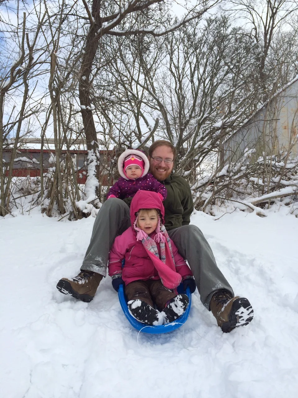 We all played in the snow today! The girls enjoyed sledding with their Papa. Gwen didn’t care for the snow quite as much as Josie and Abby. After her first forward fall, she decided it made good sense to stay mostly in one place. Josie attempted to wander around in the deep snow and wasn’t bothered by her many snowy faces. Abby enjoyed climbing on the huge snow piles, making snow angels, and sledding. Big girls can have all the fun.