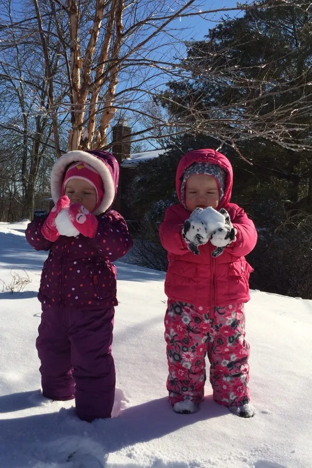 The girls and I played outside in the snow this afternoon. I’m not sure what Gwen and Josie really thought about it. They never fussed, but they didn’t smile much either. They seemed to like eating snowballs and being pulled around in the sled. Abby liked playing chauffeur. I think we all enjoyed the sunshine. It was especially exquisite reflected through the ice on the trees.