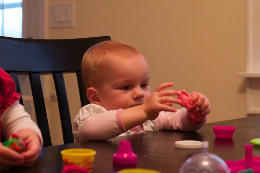 On this rainy day, our word of the day was definitely dough. The girls played with playdoh, we made cookie dough, and Abby earned some dough by helping to put away the dishes.