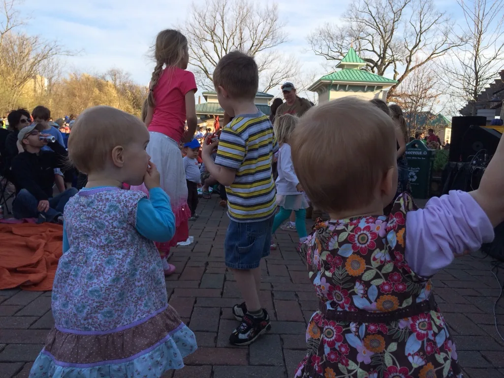 We had a blast at Tunes and Blooms this evening! We first enjoyed a picnic dinner and lots of exploring by the reptile house. When the music started, we cut through the crowd to join the other youngsters in the “mosh pit.” Our girls loved dancing, and were surprisingly not shy around all the strangers.