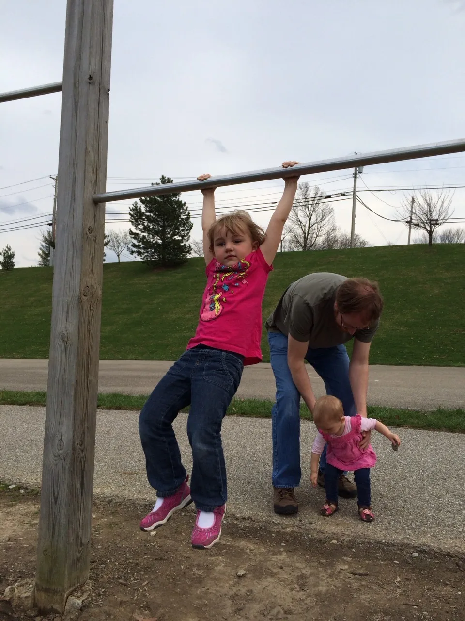 The girls and I took a walk to the park this afternoon. It was a good thing that John met us there with the van after work because they wore themselves out! I’m amazed by how far they can walk (all the way around the ½ mile path at Freedom Park) and how fearless they are on the play structures.