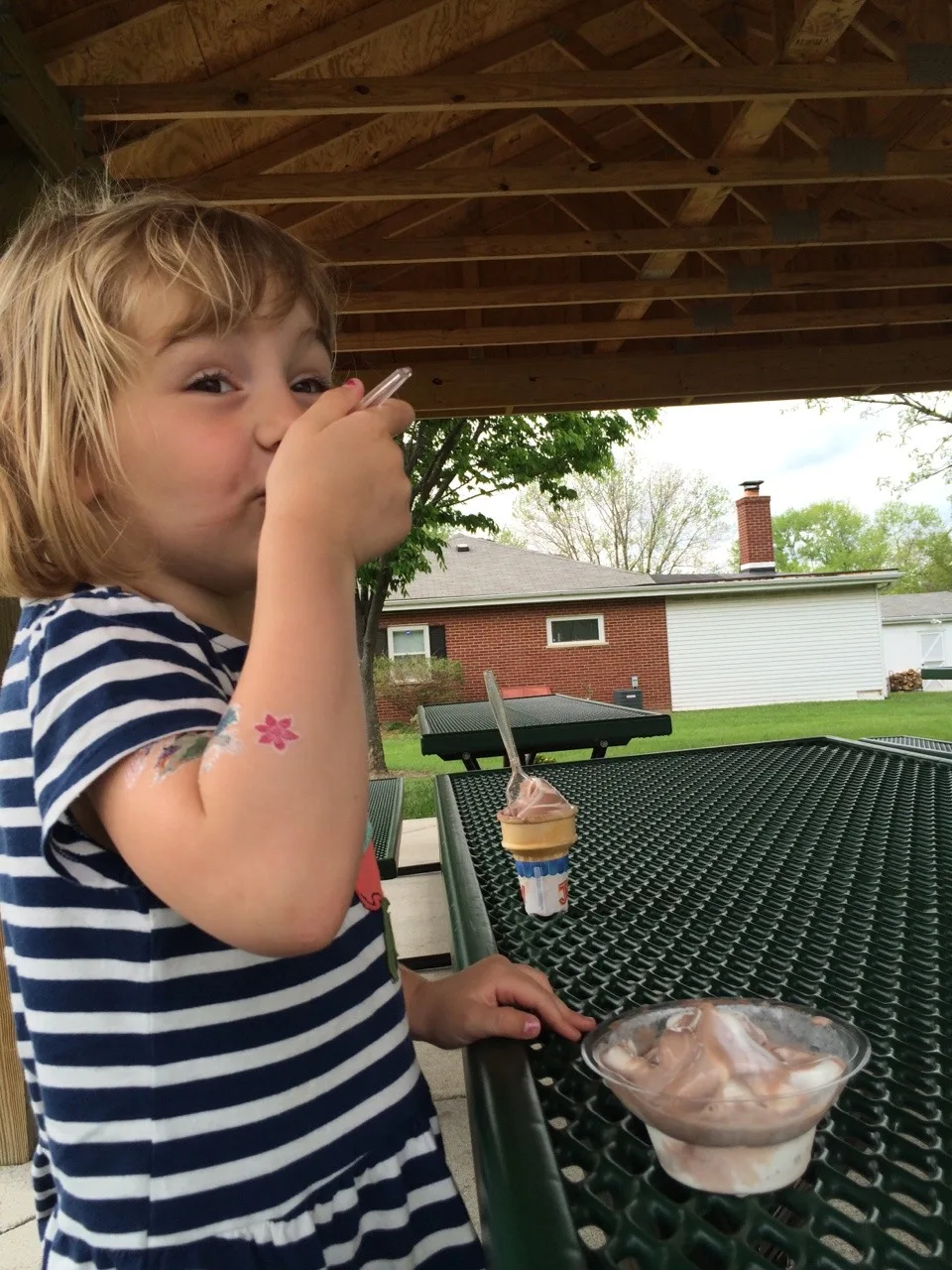 Ah, what a good day today turned out to be! I mostly wrote the day off this morning since I knew Gwen and Josie would get their eighteen month shots today, but, apparently, they’re troopers! After their afternoon naps, we took a nice long walk to get ice cream. Then after dinner, my helpers assisted me with turning over the garden bed while Papa mowed the grass. They even had a good time on the swings.