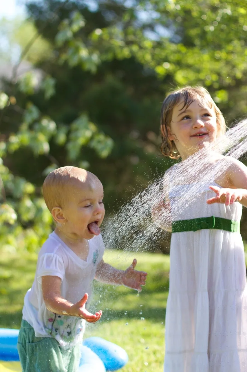 The girls, especially Gwen, had so much fun playing in the hose today. Gwen loved being sprayed in the face – just like her big sister at this age. I think we might have at least two future swimmers amongst us!