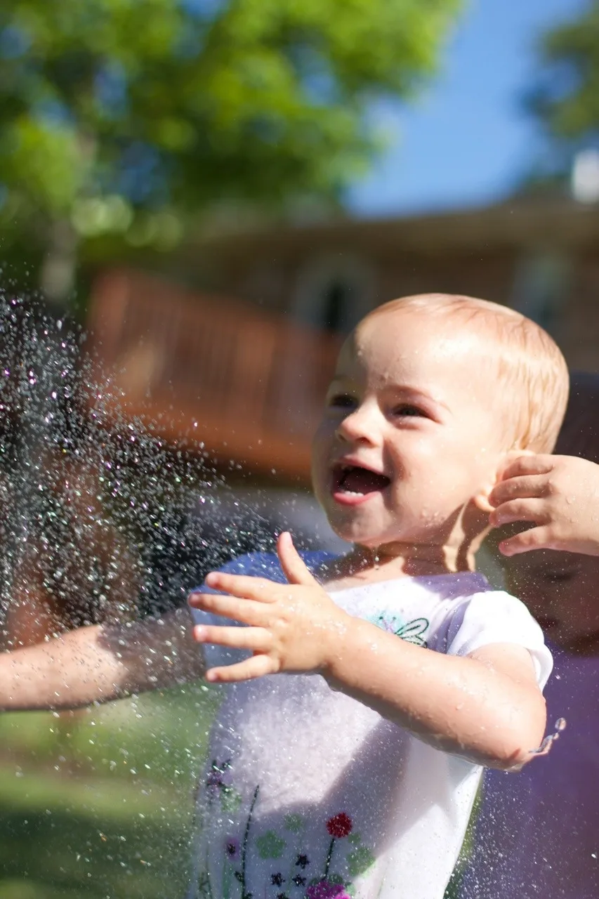 The girls, especially Gwen, had so much fun playing in the hose today. Gwen loved being sprayed in the face – just like her big sister at this age. I think we might have at least two future swimmers amongst us!