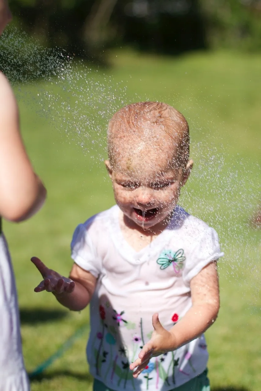 The girls, especially Gwen, had so much fun playing in the hose today. Gwen loved being sprayed in the face – just like her big sister at this age. I think we might have at least two future swimmers amongst us!
