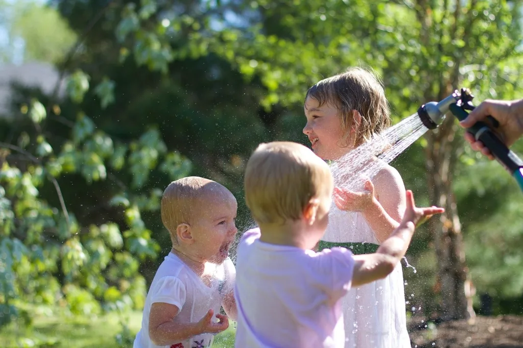 The girls, especially Gwen, had so much fun playing in the hose today. Gwen loved being sprayed in the face – just like her big sister at this age. I think we might have at least two future swimmers amongst us!