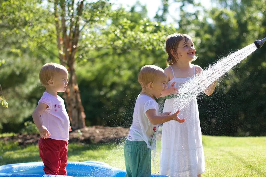 The girls, especially Gwen, had so much fun playing in the hose today. Gwen loved being sprayed in the face – just like her big sister at this age. I think we might have at least two future swimmers amongst us!