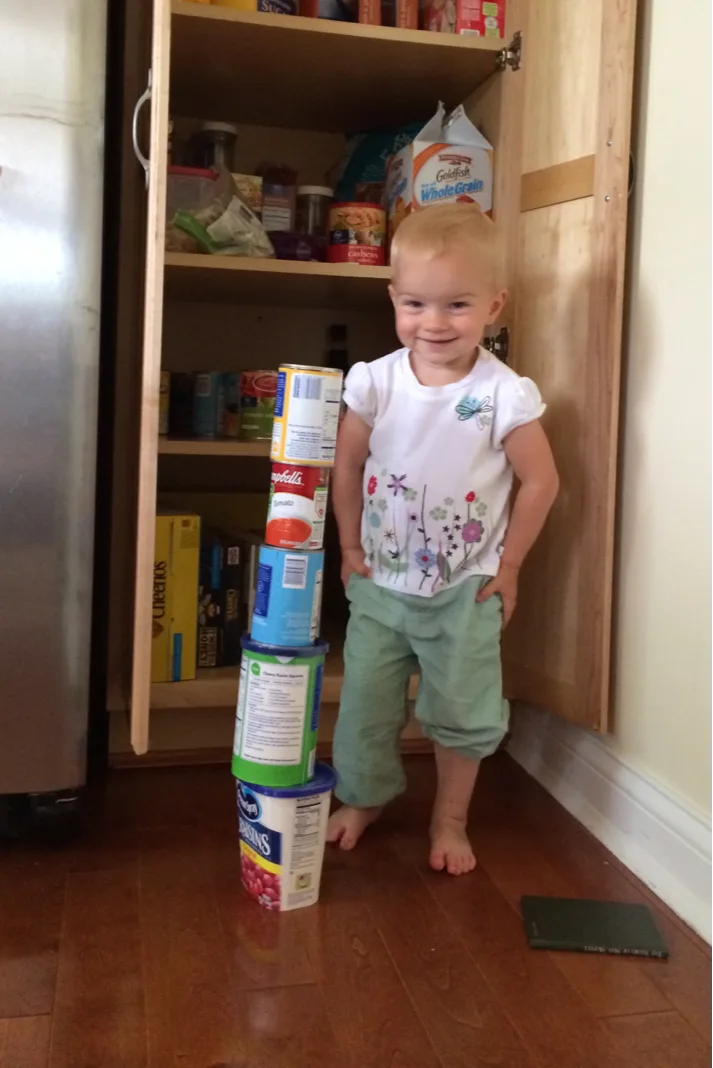 After helping to put away the groceries, Gwen decided to play. Look at that proud face!