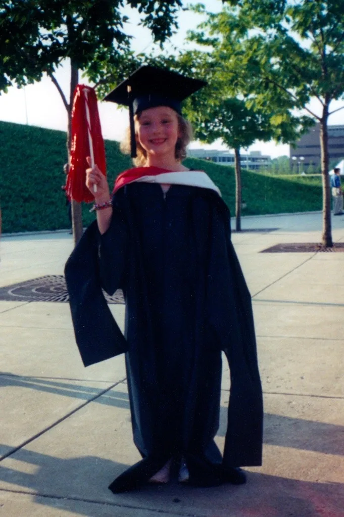 Abby at Clara’s high school graduation today & Clara at my UC master’s school graduation in 2002.