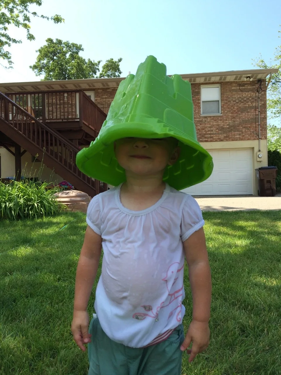Sprinkler fun – our now daily summer pastime.