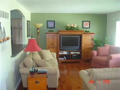 Here are the photos from the listing for our house when we bought it in 2010. I certainly don’t miss the dark colors and the famous “banana boat” fan. It’s amazing to look back and think about all the changes we made since then. Some highlights:

*   painted every room
*   replaced all the carpet
*   replaced every light fixture and outlet
*   replaced every door knob and hinge
*   added window trim in the bedrooms and kitchen
*   updated the deck

We came a long way!