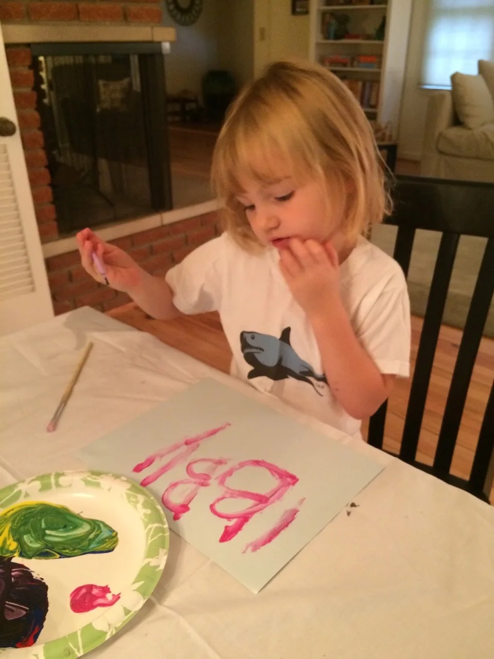 Three girls, three painting personalities… I brought out two pieces of paper for each girl. Josie was so busy mixing paint colors on her plate that she barely used one sheet. Gwen used one sheet too, but only because she was focused and determined to perfect her masterpiece. Abby, on the other hand, happily snatched up the spare paper. She needed to paint pictures for everyone!

Thirty plus minutes of painting was pretty good for little ones. If it had kept them occupied longer, I would have given them all the paper they wanted! 😉