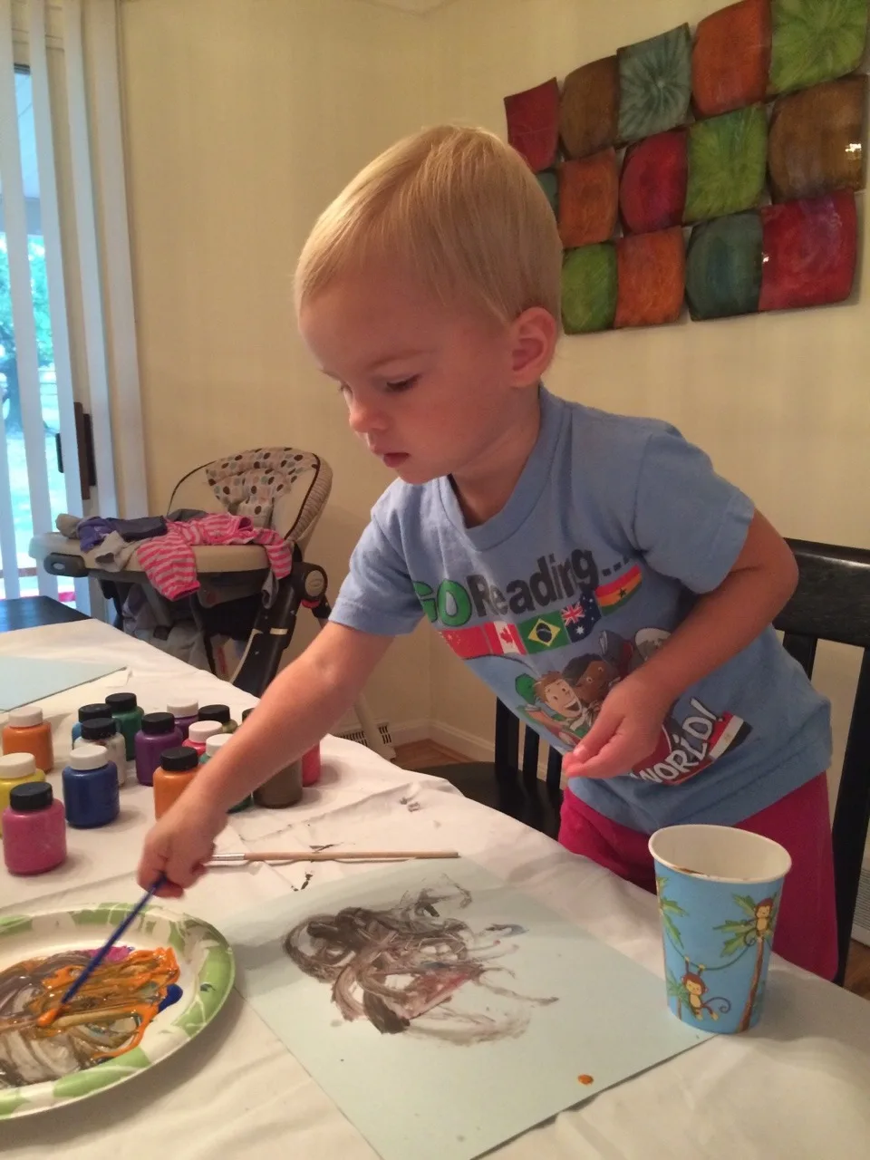 Three girls, three painting personalities… I brought out two pieces of paper for each girl. Josie was so busy mixing paint colors on her plate that she barely used one sheet. Gwen used one sheet too, but only because she was focused and determined to perfect her masterpiece. Abby, on the other hand, happily snatched up the spare paper. She needed to paint pictures for everyone!

Thirty plus minutes of painting was pretty good for little ones. If it had kept them occupied longer, I would have given them all the paper they wanted! 😉