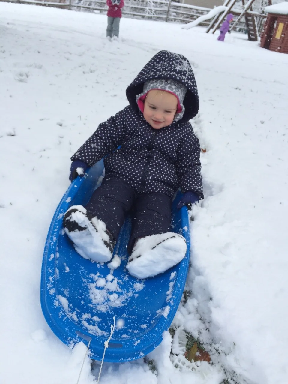 The girls played outside for an hour today. Yay for snowsuits, waterproof gloves, and snow boots. Too bad I don’t have snow boots or a snowsuit. Guess what I’m asking Santa (John) for this year.