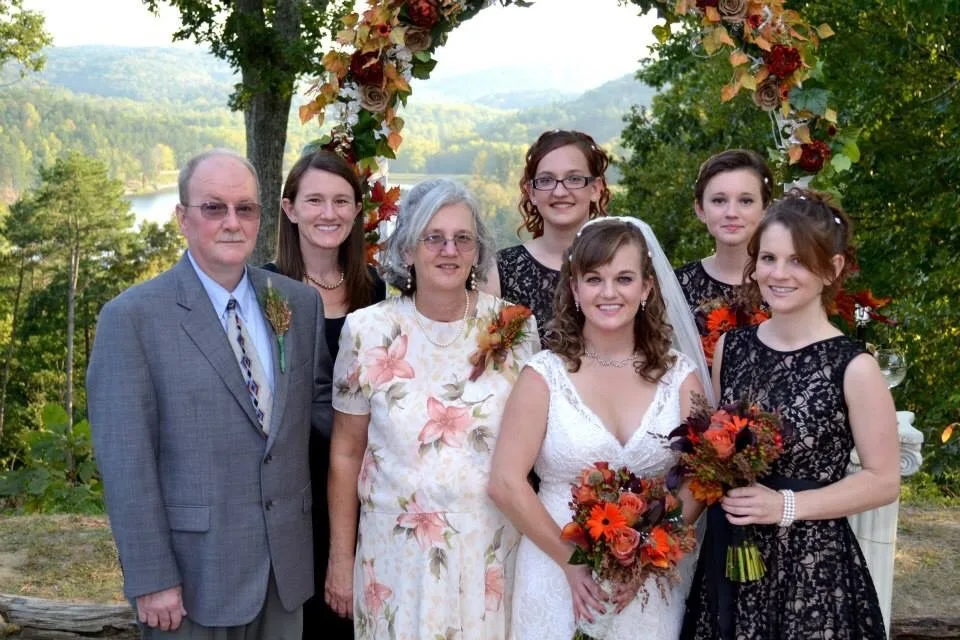 With 616 professional photos to choose from, it was hard to pick just ten favorites from Mel and Ron’s wedding, but here are some that captured the ceremony, reception, families, and wedding party.