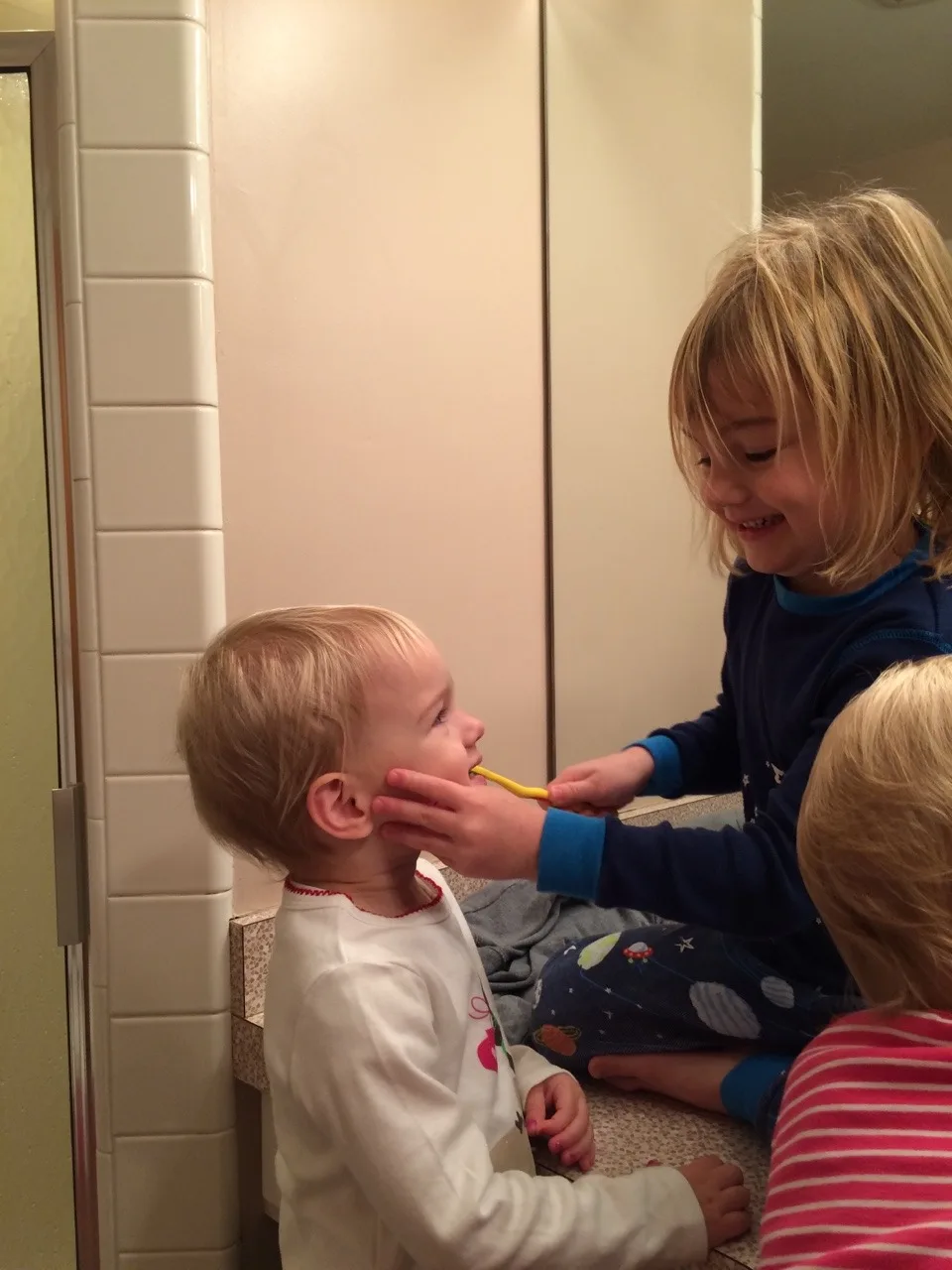I get tears, but Gwen is all smiles when Abby brushes her teeth. I guess we have to go with what works!
