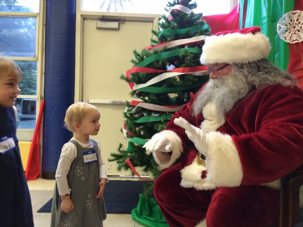 We all had a good time this morning at the Moeller Rugby Breakfast with Santa. Craft time with “Tickle Monster” Joey was especially popular. It took nearly two hours, but the girls eventually warmed up to the idea of visiting with Santa. Abby said she was going to test him to see if he was the real Santa by asking him if he had reindeer. He passed!