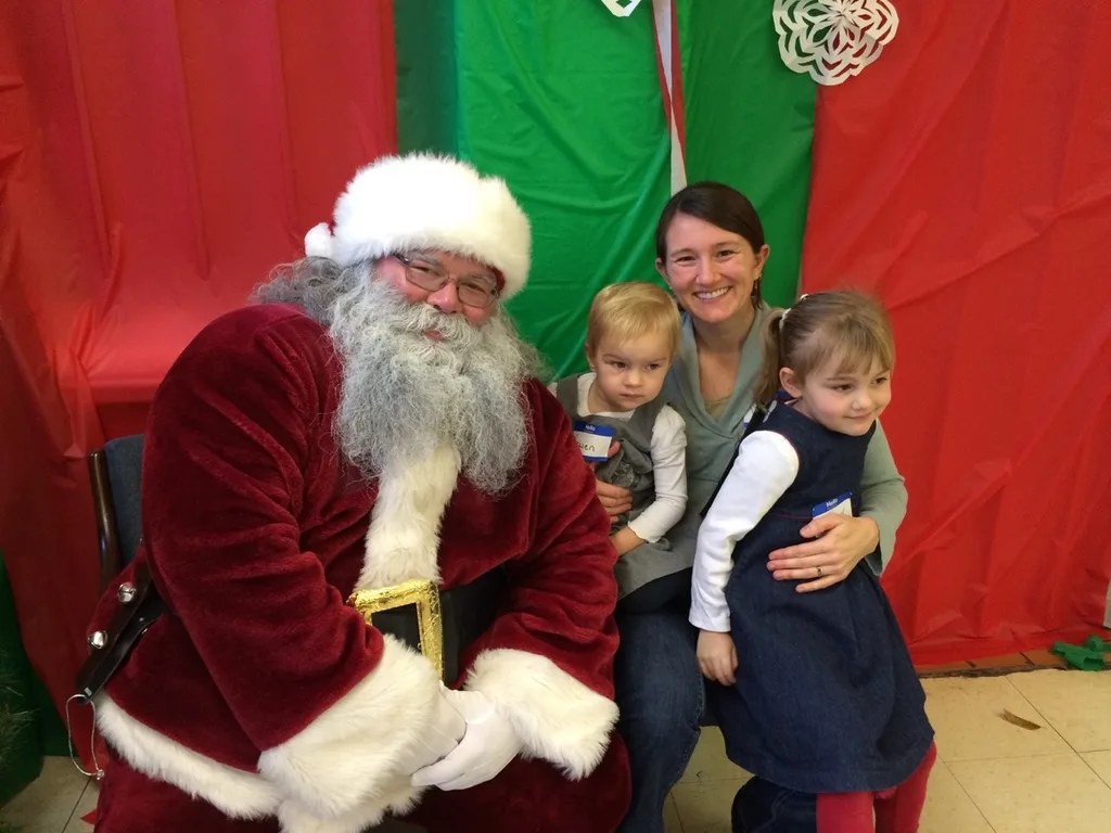 We all had a good time this morning at the Moeller Rugby Breakfast with Santa. Craft time with “Tickle Monster” Joey was especially popular. It took nearly two hours, but the girls eventually warmed up to the idea of visiting with Santa. Abby said she was going to test him to see if he was the real Santa by asking him if he had reindeer. He passed!